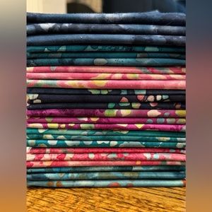 Lot Of New 24 Fat Quarter pieces in this bundle makes 6 yards.